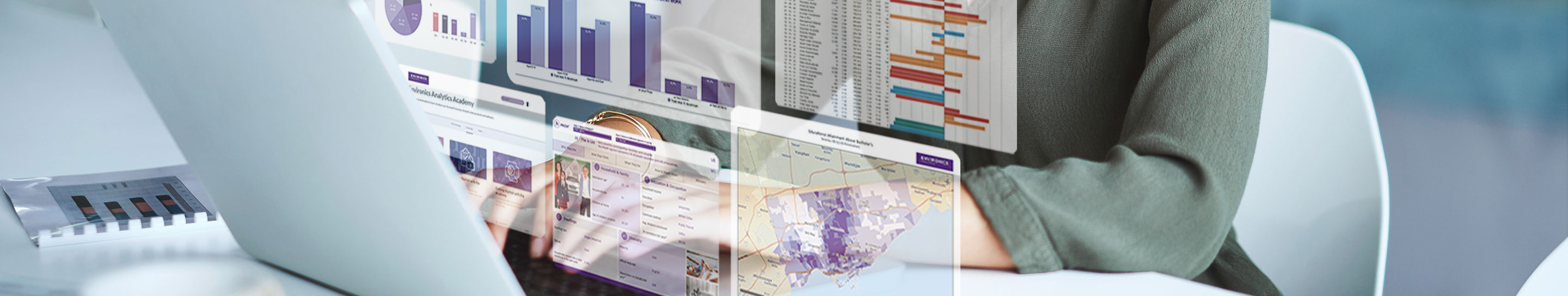 Hands typing on a keyboard with 3d rendering of floating charts